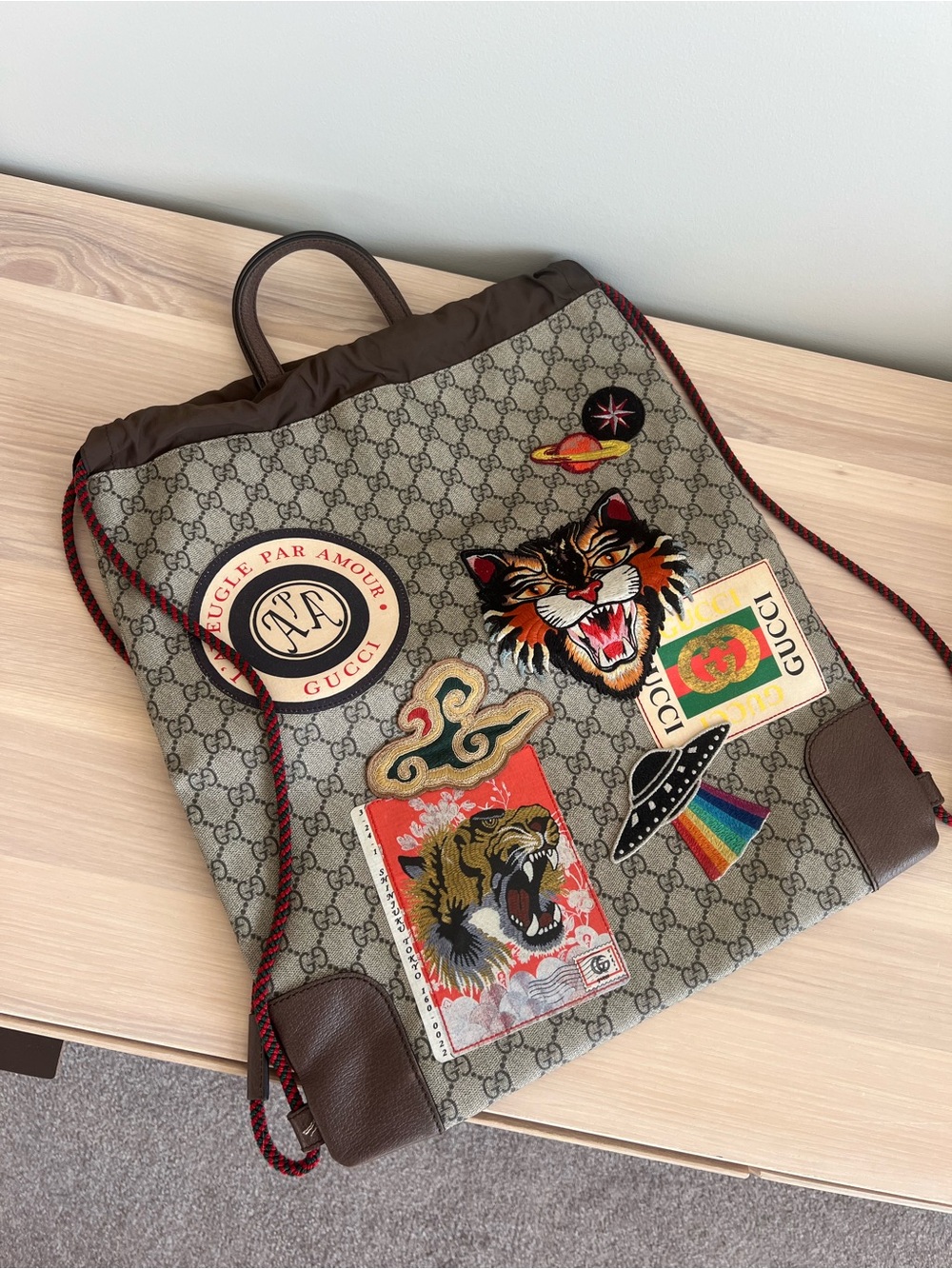 Rare Gucci GG Supreme Canvas and Embroidered Patch Courier Drawstring Backpack